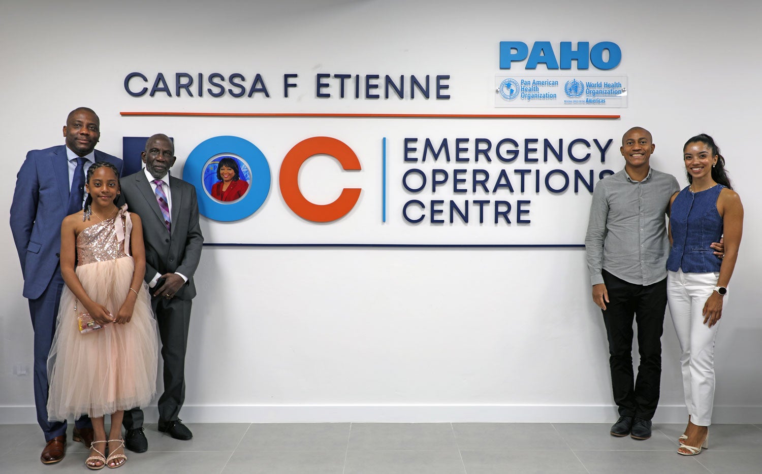 Family members of Dr. Carissa Etienne take part in the inauguration of the Emergency Operation Center in Barbados.