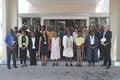 Photo of the group of participants on the workshop on QualityRights, shown standing in three rows at the door of a building